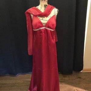 Red silky evening gown with “diamond” cross-back
